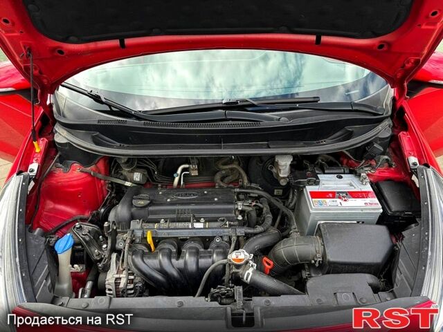 Красный Киа Рио, объемом двигателя 1.4 л и пробегом 84 тыс. км за 13200 $, фото 8 на Automoto.ua