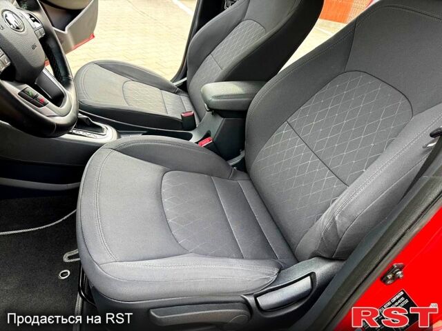 Красный Киа Рио, объемом двигателя 1.4 л и пробегом 84 тыс. км за 13200 $, фото 6 на Automoto.ua