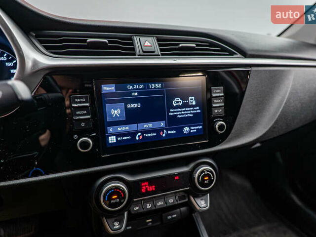 Червоний Кіа Ріо, об'ємом двигуна 1.6 л та пробігом 56 тис. км за 15556 $, фото 15 на Automoto.ua