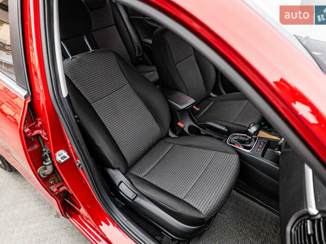 Червоний Кіа Ріо, об'ємом двигуна 1.6 л та пробігом 56 тис. км за 15556 $, фото 18 на Automoto.ua