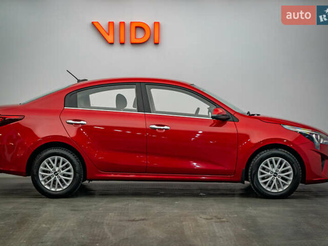 Червоний Кіа Ріо, об'ємом двигуна 1.6 л та пробігом 56 тис. км за 15556 $, фото 4 на Automoto.ua