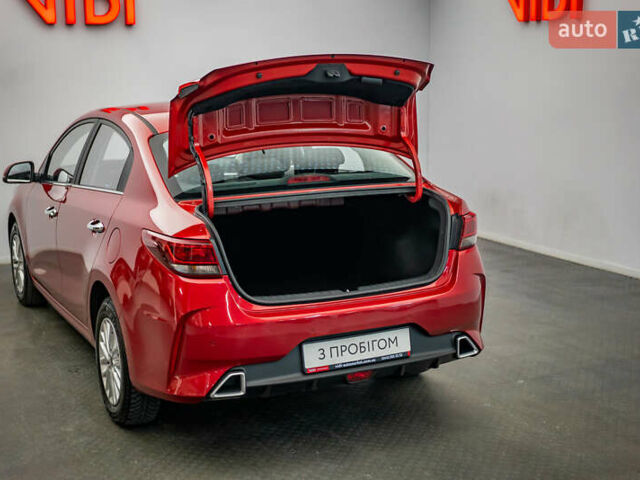 Червоний Кіа Ріо, об'ємом двигуна 1.6 л та пробігом 56 тис. км за 15556 $, фото 7 на Automoto.ua