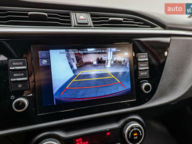 Червоний Кіа Ріо, об'ємом двигуна 1.6 л та пробігом 56 тис. км за 15556 $, фото 16 на Automoto.ua