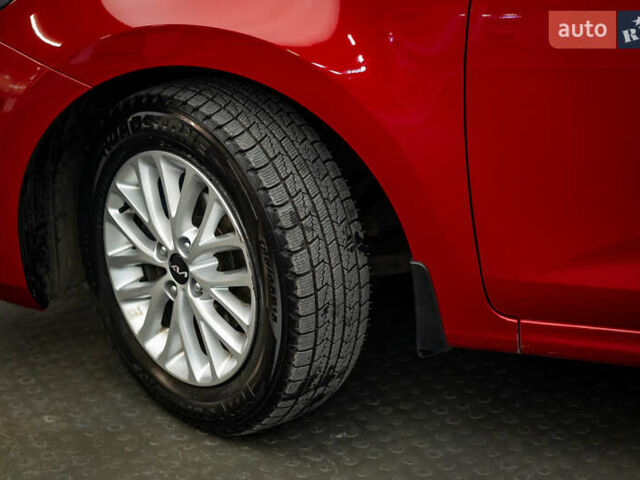 Червоний Кіа Ріо, об'ємом двигуна 1.6 л та пробігом 56 тис. км за 15556 $, фото 8 на Automoto.ua