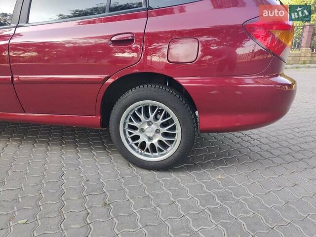 Красный Киа Рио, объемом двигателя 1.5 л и пробегом 185 тыс. км за 3500 $, фото 13 на Automoto.ua