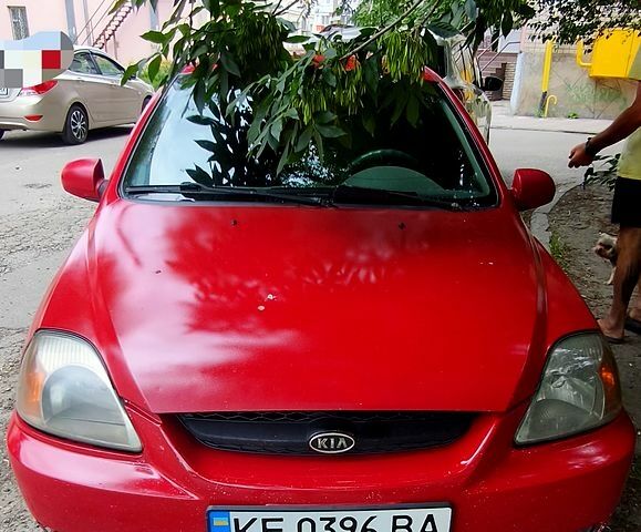 Червоний Кіа Ріо, об'ємом двигуна 1.5 л та пробігом 317 тис. км за 1900 $, фото 1 на Automoto.ua