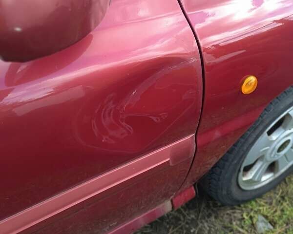 Кіа Ріо 2003 у Харкові на Automoto.ua Червоний Кіа Ріо, об'ємом двигуна 1.34 л та пробігом 221 тис. км за 3212 $, фото 5 на Automoto.ua