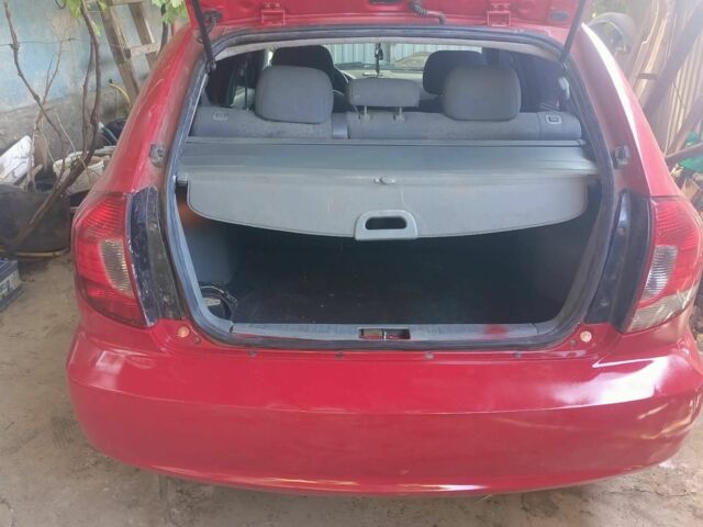 Красный Киа Рио, объемом двигателя 1.5 л и пробегом 300 тыс. км за 2500 $, фото 2 на Automoto.ua