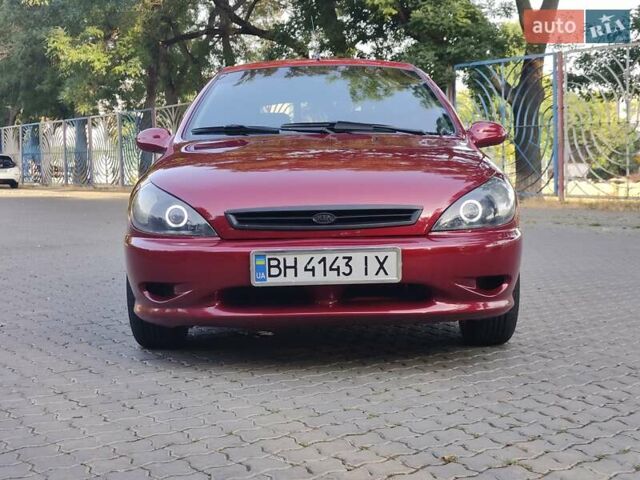 Красный Киа Рио, объемом двигателя 1.5 л и пробегом 185 тыс. км за 3500 $, фото 2 на Automoto.ua