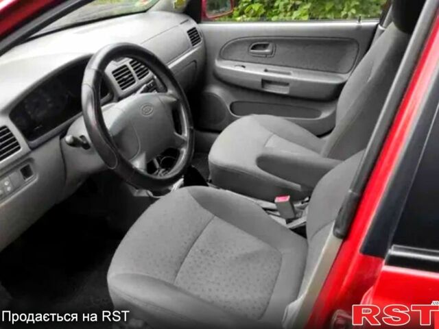 Красный Киа Рио, объемом двигателя 1.3 л и пробегом 222 тыс. км за 3200 $, фото 5 на Automoto.ua