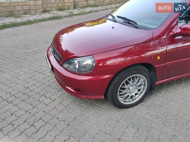 Красный Киа Рио, объемом двигателя 1.5 л и пробегом 185 тыс. км за 3500 $, фото 7 на Automoto.ua