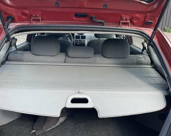 Червоний Кіа Ріо, об'ємом двигуна 1.5 л та пробігом 202 тис. км за 3200 $, фото 13 на Automoto.ua