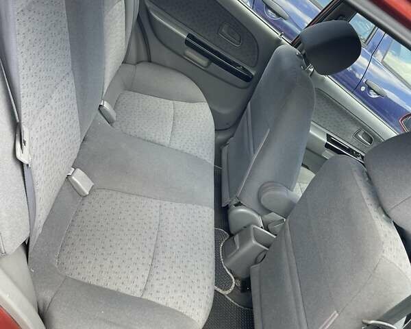 Червоний Кіа Ріо, об'ємом двигуна 1.5 л та пробігом 202 тис. км за 3200 $, фото 10 на Automoto.ua