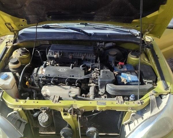 Жовтий Кіа Ріо, об'ємом двигуна 1.34 л та пробігом 270 тис. км за 1600 $, фото 6 на Automoto.ua