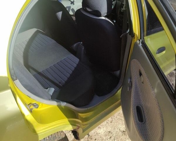 Жовтий Кіа Ріо, об'ємом двигуна 1.34 л та пробігом 270 тис. км за 1600 $, фото 7 на Automoto.ua