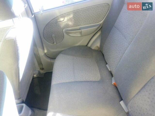 Желтый Киа Рио, объемом двигателя 1.3 л и пробегом 150 тыс. км за 3950 $, фото 8 на Automoto.ua