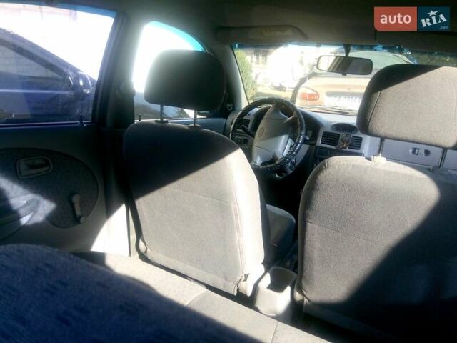 Желтый Киа Рио, объемом двигателя 1.3 л и пробегом 150 тыс. км за 3950 $, фото 12 на Automoto.ua