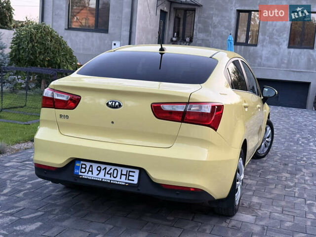 Жовтий Кіа Ріо, об'ємом двигуна 1.59 л та пробігом 139 тис. км за 9600 $, фото 7 на Automoto.ua