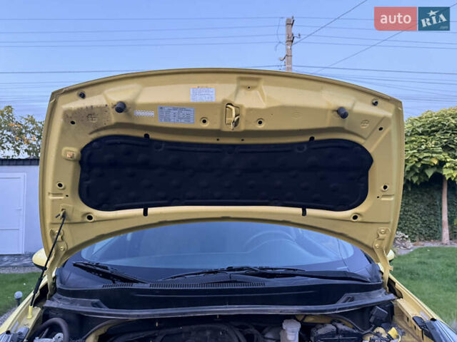 Жовтий Кіа Ріо, об'ємом двигуна 1.59 л та пробігом 139 тис. км за 9600 $, фото 15 на Automoto.ua