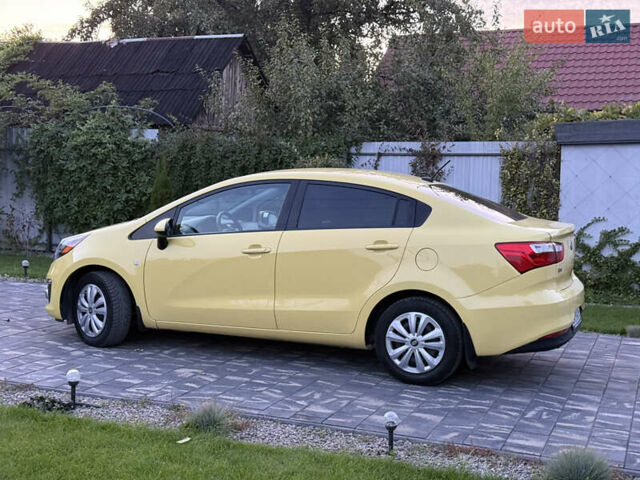Жовтий Кіа Ріо, об'ємом двигуна 1.59 л та пробігом 139 тис. км за 9600 $, фото 9 на Automoto.ua
