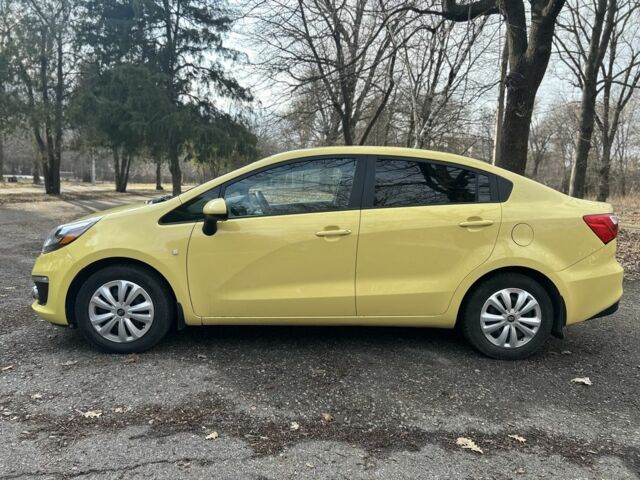 Желтый Киа Рио, объемом двигателя 1.6 л и пробегом 145 тыс. км за 8800 $, фото 7 на Automoto.ua