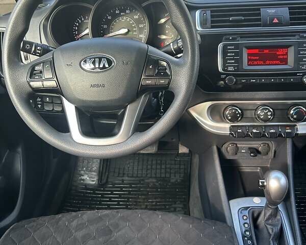 Жовтий Кіа Ріо, об'ємом двигуна 1.6 л та пробігом 140 тис. км за 8700 $, фото 11 на Automoto.ua