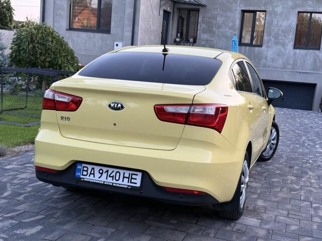 Желтый Киа Рио, объемом двигателя 1.6 л и пробегом 139 тыс. км за 9600 $, фото 2 на Automoto.ua