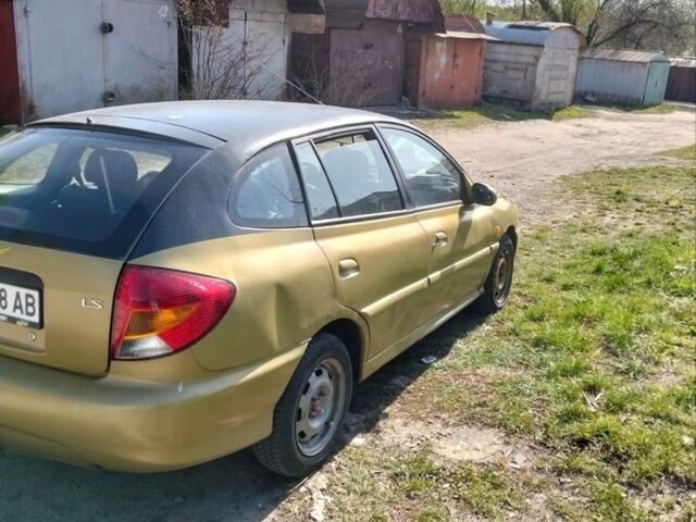 Желтый Киа Рио, объемом двигателя 1.5 л и пробегом 147 тыс. км за 1550 $, фото 8 на Automoto.ua