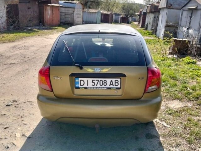 Желтый Киа Рио, объемом двигателя 1.5 л и пробегом 147 тыс. км за 1550 $, фото 6 на Automoto.ua