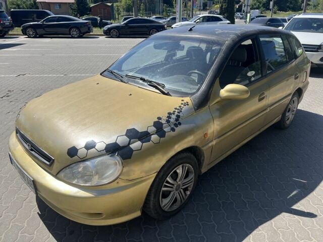 Жовтий Кіа Ріо, об'ємом двигуна 1.5 л та пробігом 150 тис. км за 1350 $, фото 2 на Automoto.ua