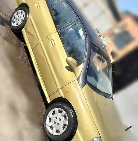 Желтый Киа Рио, объемом двигателя 1.5 л и пробегом 147 тыс. км за 2100 $, фото 4 на Automoto.ua