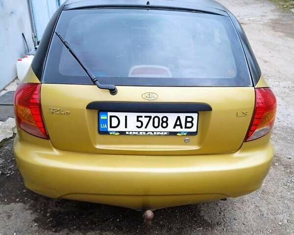 Желтый Киа Рио, объемом двигателя 1.5 л и пробегом 147 тыс. км за 2100 $, фото 3 на Automoto.ua