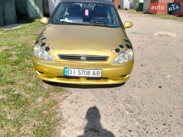 Желтый Киа Рио, объемом двигателя 1.5 л и пробегом 147 тыс. км за 1800 $, фото 2 на Automoto.ua
