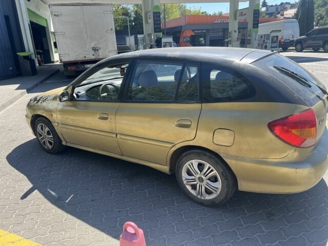 Жовтий Кіа Ріо, об'ємом двигуна 1.5 л та пробігом 150 тис. км за 1350 $, фото 1 на Automoto.ua