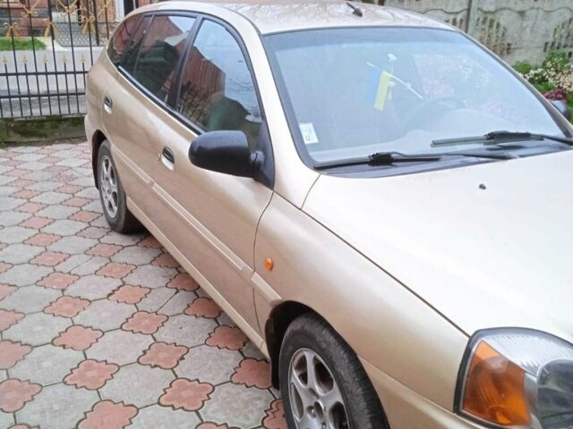 Жовтий Кіа Ріо, об'ємом двигуна 1.34 л та пробігом 214 тис. км за 2700 $, фото 9 на Automoto.ua