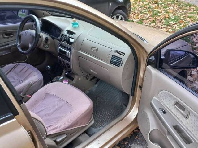 Жовтий Кіа Ріо, об'ємом двигуна 1.3 л та пробігом 156 тис. км за 2500 $, фото 10 на Automoto.ua