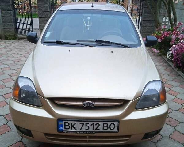 Желтый Киа Рио, объемом двигателя 1.34 л и пробегом 214 тыс. км за 2700 $, фото 8 на Automoto.ua