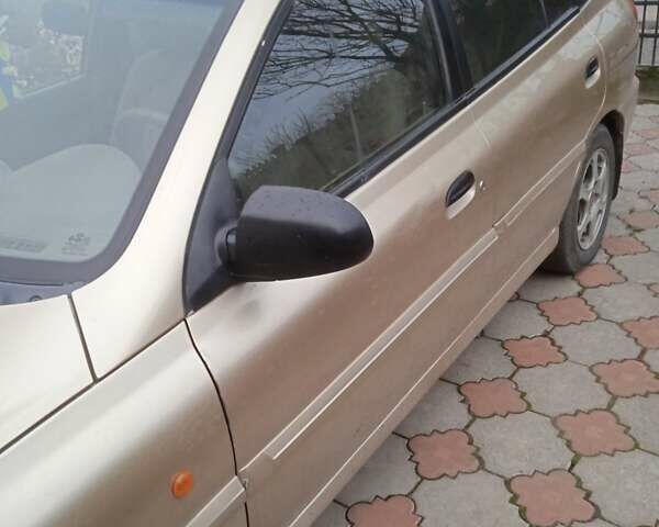 Желтый Киа Рио, объемом двигателя 1.34 л и пробегом 214 тыс. км за 2700 $, фото 7 на Automoto.ua