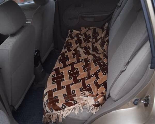 Желтый Киа Рио, объемом двигателя 1.34 л и пробегом 214 тыс. км за 2700 $, фото 2 на Automoto.ua