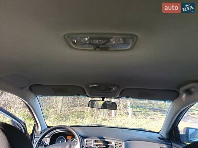 Сірий Кіа Ріо, об'ємом двигуна 1.49 л та пробігом 272 тис. км за 4500 $, фото 12 на Automoto.ua