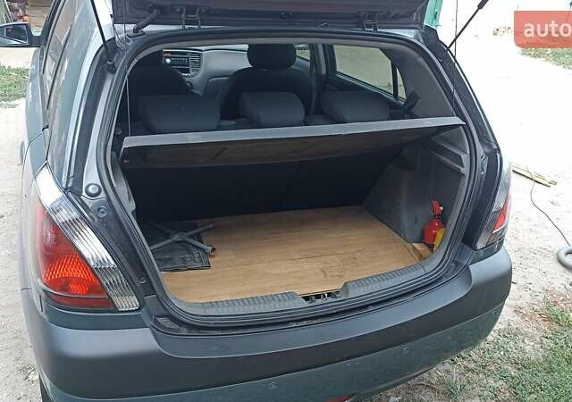 Серый Киа Рио, объемом двигателя 1.4 л и пробегом 194 тыс. км за 5999 $, фото 12 на Automoto.ua