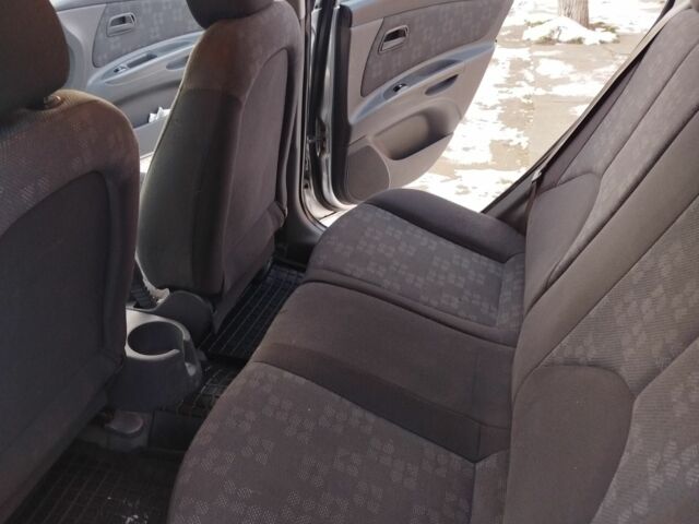 Сірий Кіа Ріо, об'ємом двигуна 1.4 л та пробігом 147 тис. км за 5500 $, фото 2 на Automoto.ua