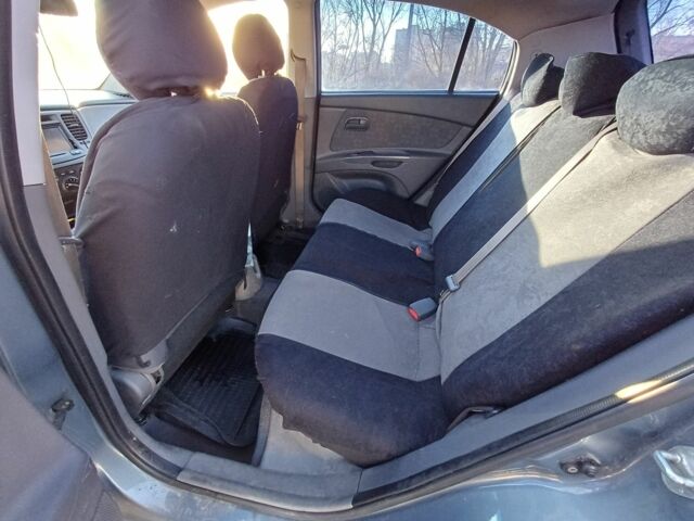 Сірий Кіа Ріо, об'ємом двигуна 1.4 л та пробігом 357 тис. км за 3800 $, фото 5 на Automoto.ua