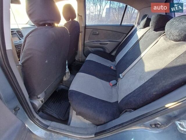 Серый Киа Рио, объемом двигателя 1.4 л и пробегом 357 тыс. км за 3800 $, фото 9 на Automoto.ua