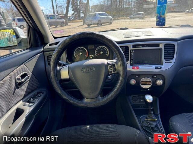 Серый Киа Рио, объемом двигателя 1.4 л и пробегом 196 тыс. км за 4450 $, фото 9 на Automoto.ua