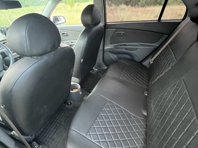 Серый Киа Рио, объемом двигателя 1.5 л и пробегом 230 тыс. км за 3999 $, фото 4 на Automoto.ua