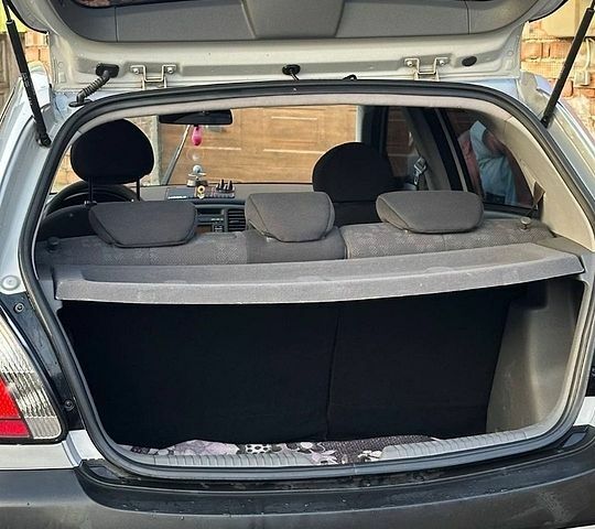 Сірий Кіа Ріо, об'ємом двигуна 1.4 л та пробігом 136 тис. км за 5200 $, фото 9 на Automoto.ua