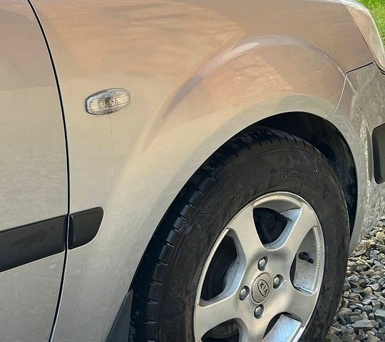 Серый Киа Рио, объемом двигателя 1.4 л и пробегом 136 тыс. км за 5200 $, фото 22 на Automoto.ua