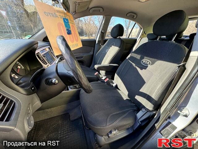 Серый Киа Рио, объемом двигателя 1.4 л и пробегом 196 тыс. км за 4450 $, фото 6 на Automoto.ua