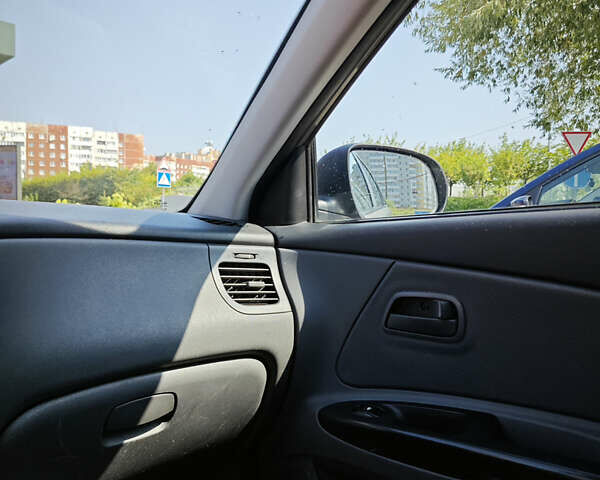 Сірий Кіа Ріо, об'ємом двигуна 1.4 л та пробігом 213 тис. км за 6000 $, фото 10 на Automoto.ua